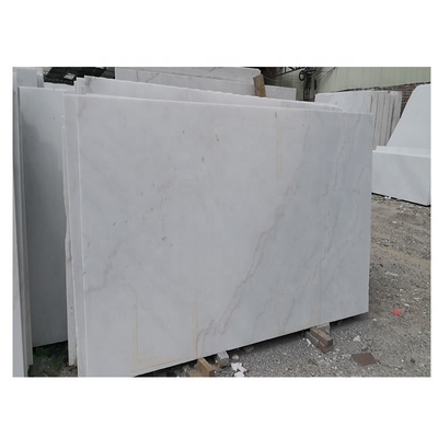 Fabbricazione di rivestimenti di superfici a fiamma di pietra di marmo bianco