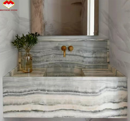 Pannello murario del bagno dell' hotel e vasca di vanità con lavandino in pietra naturale marmo onyx
