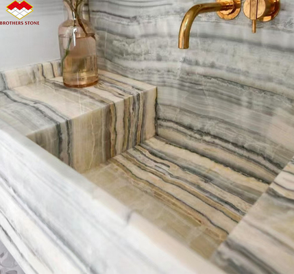 Pannello murario del bagno dell' hotel e vasca di vanità con lavandino in pietra naturale marmo onyx