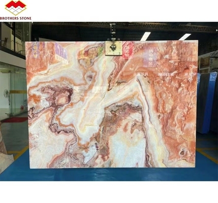 Libro di pietra di marmo di oniccio rosso retroilluminato Slab abbinato per il modello di tavolo di marmo trasparente