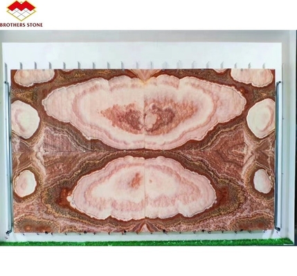 Libro di pietra di marmo di oniccio rosso retroilluminato Slab abbinato per il modello di tavolo di marmo trasparente