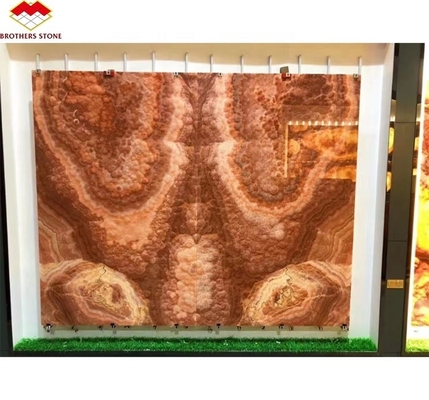 Libro di pietra di marmo di oniccio rosso retroilluminato Slab abbinato per il modello di tavolo di marmo trasparente