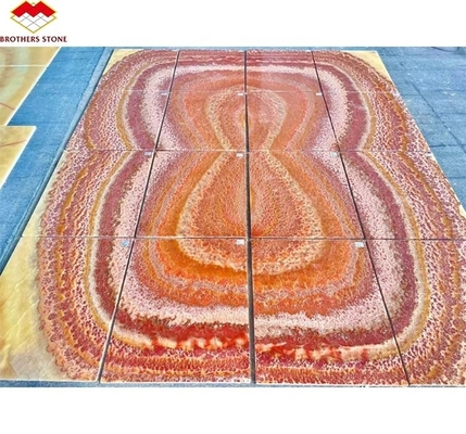 Libro di pietra di marmo di oniccio rosso retroilluminato Slab abbinato per il modello di tavolo di marmo trasparente