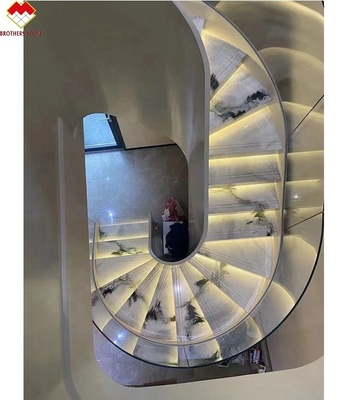 Libro aperto Pavimenti marmorei Scale a spirale con trampolini di marmo bianco e rialzatori