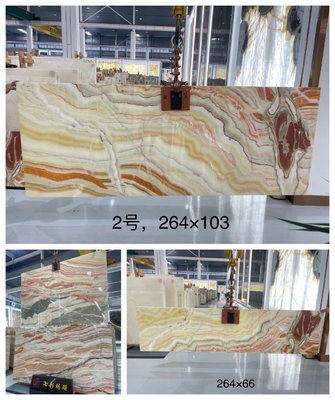 Pietra di onice arcobaleno traslucido per villa sfondo CNF lucidato marmo di onice drago rosso