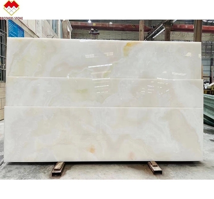 Crea una villa di lusso con la nostra lastra di marmo bianco e onice lucida e trasparente.
