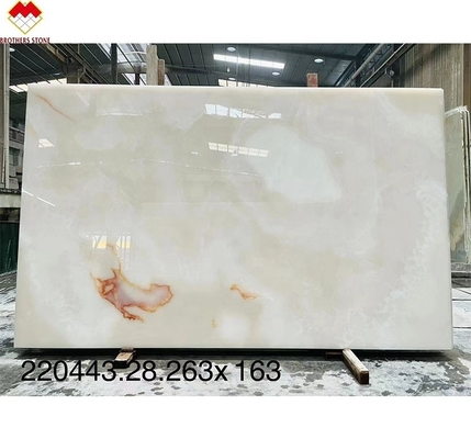 Crea una villa di lusso con la nostra lastra di marmo bianco e onice lucida e trasparente.