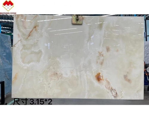 Traslucide marmo bianco Onyx grande lastra retroilluminata vene rosso/oro per la decorazione degli alberghi