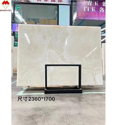 Traslucide marmo bianco Onyx grande lastra retroilluminata vene rosso/oro per la decorazione degli alberghi