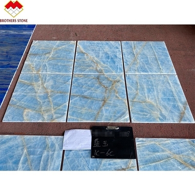 Marmo blu chiaro giada lastra di onice per piastrelle tagliate su misura vene d'oro