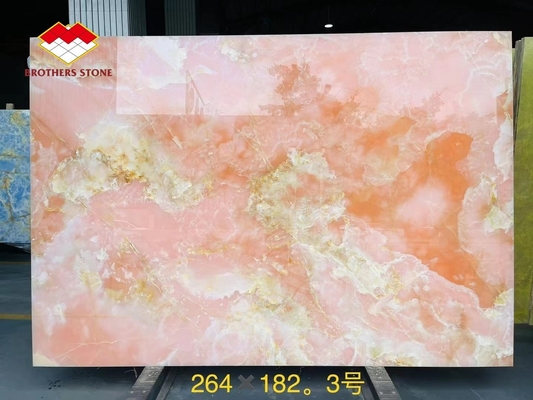 Piastrelle di porcellana di onice rosa retroilluminate di design geometrico piastrelle di tavolo rosa chiaro prezzo all'ingrosso scale di onice rosa traslucide