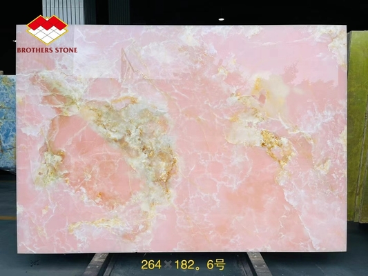 Piastrelle di porcellana di onice rosa retroilluminate di design geometrico piastrelle di tavolo rosa chiaro prezzo all'ingrosso scale di onice rosa traslucide