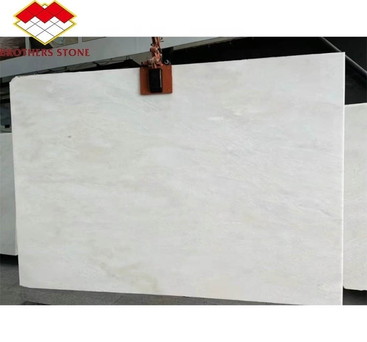 Moderna carta di marmo tagliata in onico bianco reale tagliata a misura Soluzione di progettazione grafica per pannelli di parete e set di tavolo da pranzo