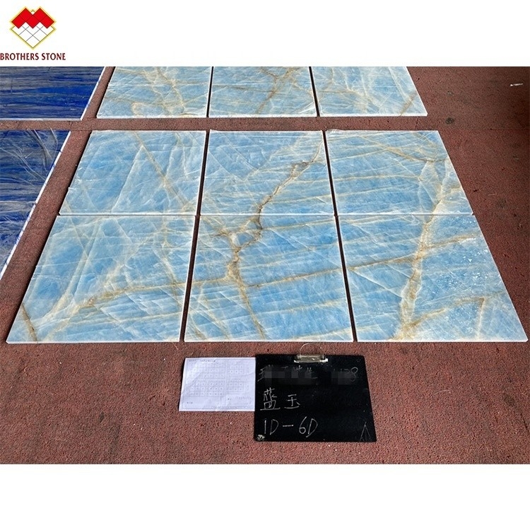 Marmo blu chiaro giada lastra di onice per piastrelle tagliate su misura vene d'oro
